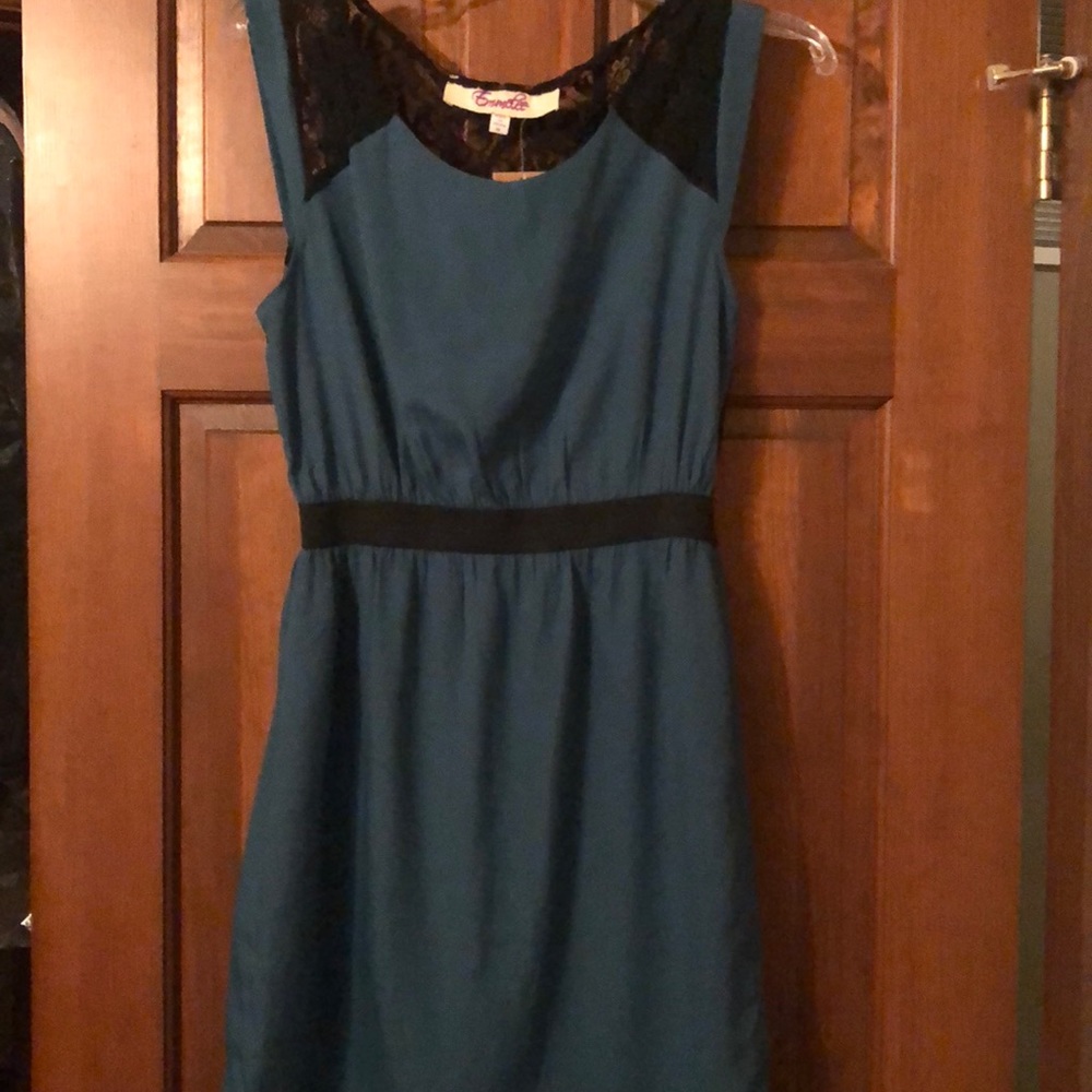 Green dress with black lace back. NWT